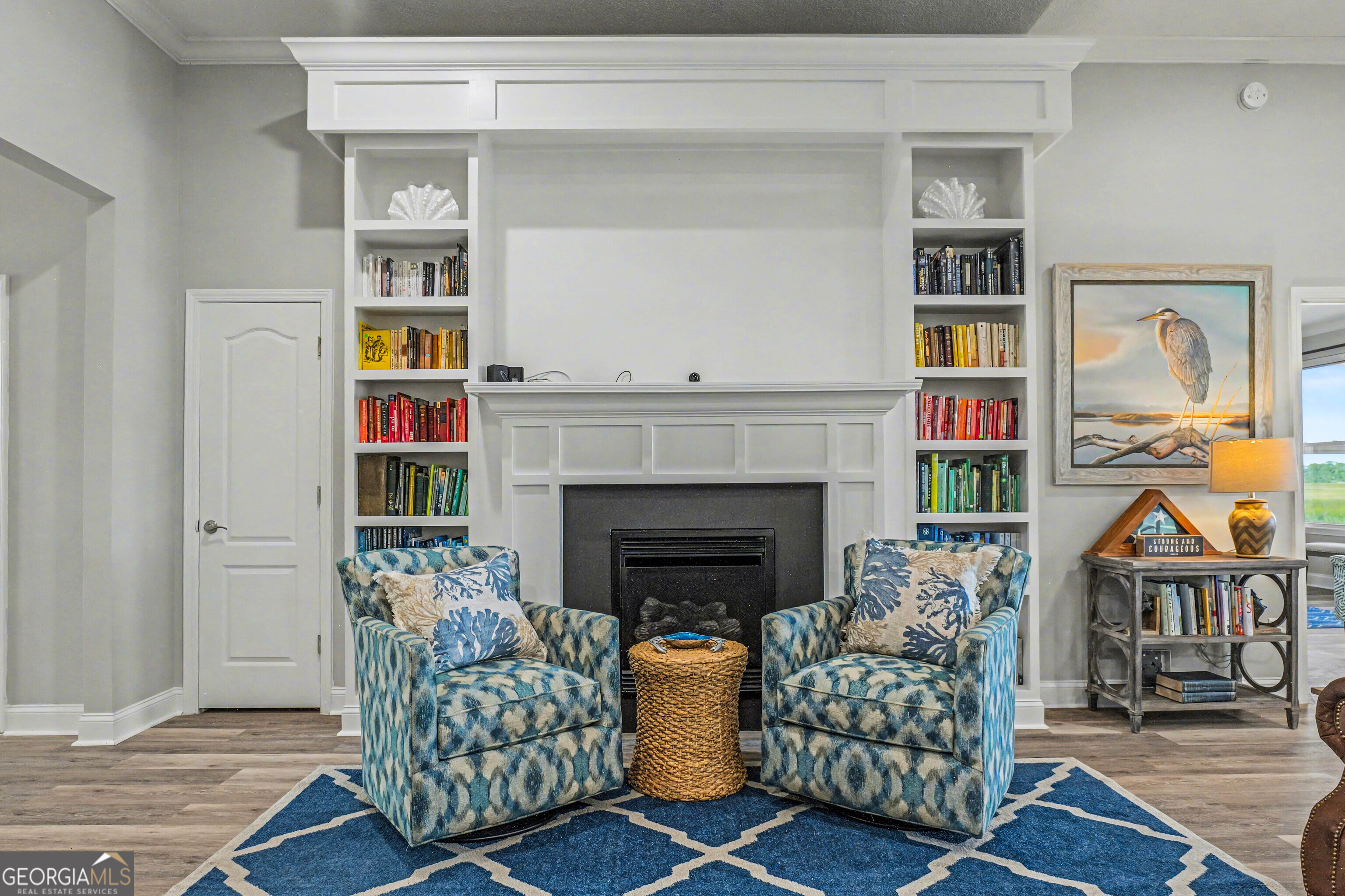 97222 Pirates Point Road Yulee, FL 32097 - Photo 10 of 82 a living room with furniture and a fireplace