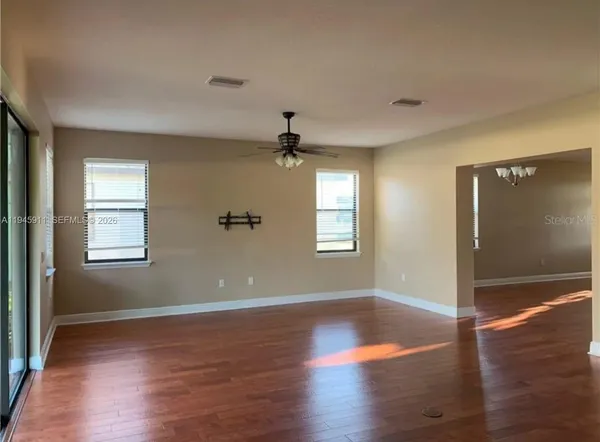 a kitchen with stainless steel appliances a refrigerator and a stove top oven