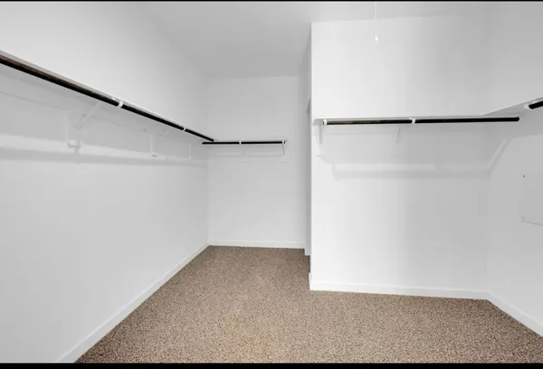 a view of a refrigerator in kitchen