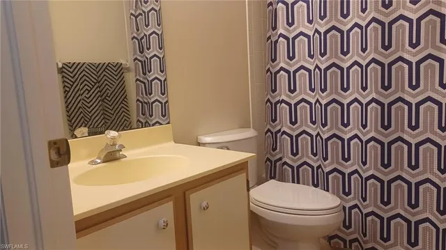 a bathroom with a sink and a toilet