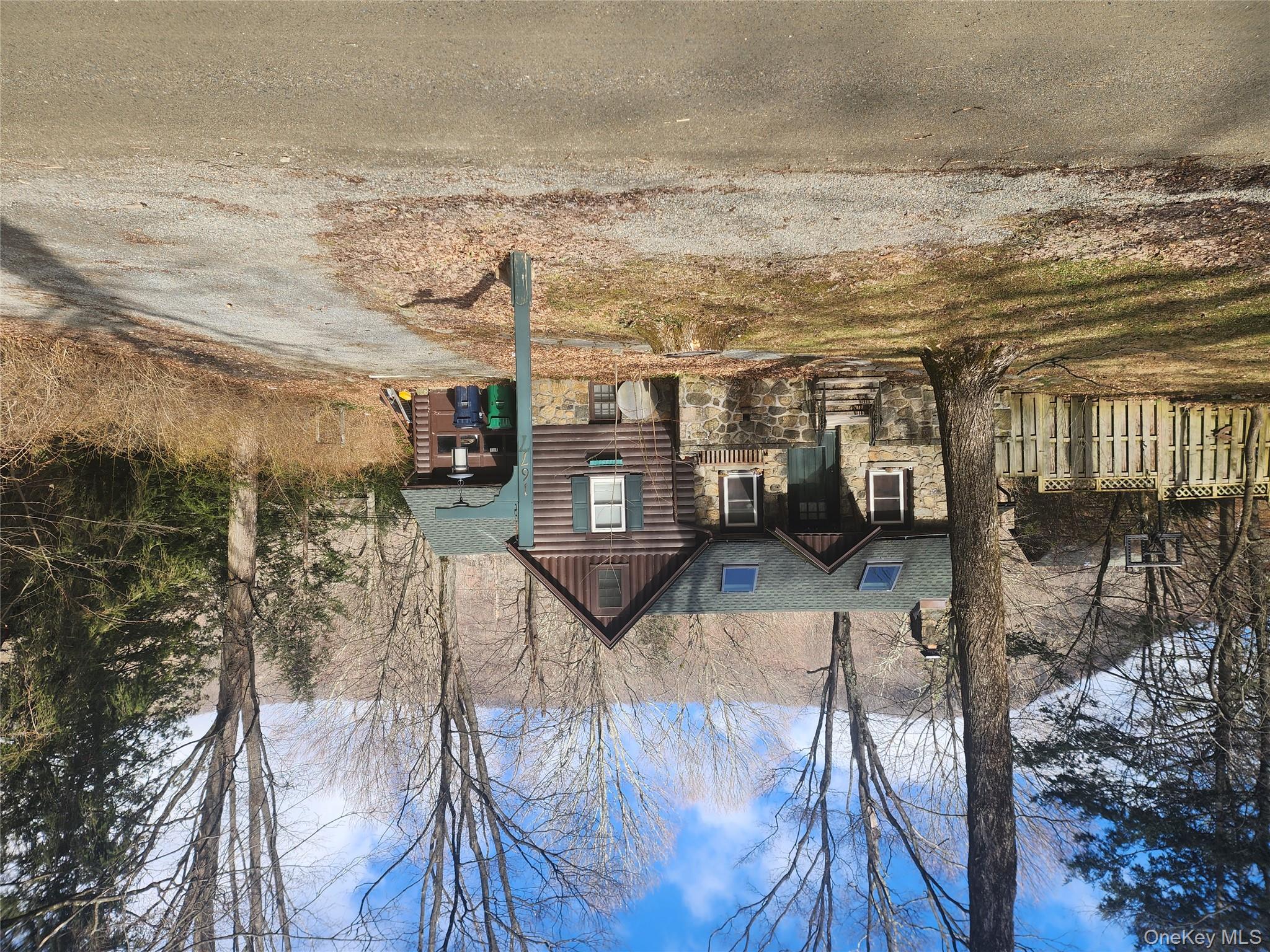 a front view of a house with a patio