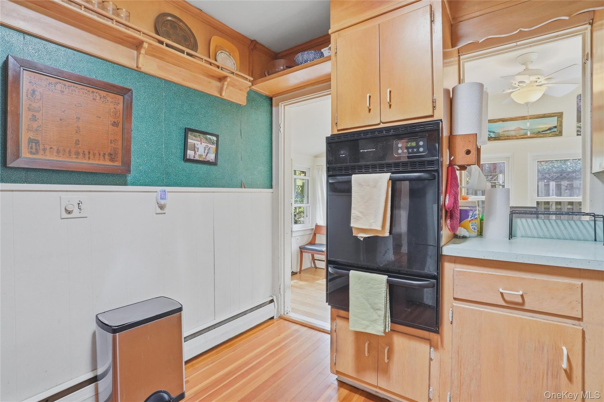 167 Highland Road Cold Spring, NY 10516 - Photo 14 of 22 The kitchen features wood flooring, built-in double ovens, and wood cabinetry