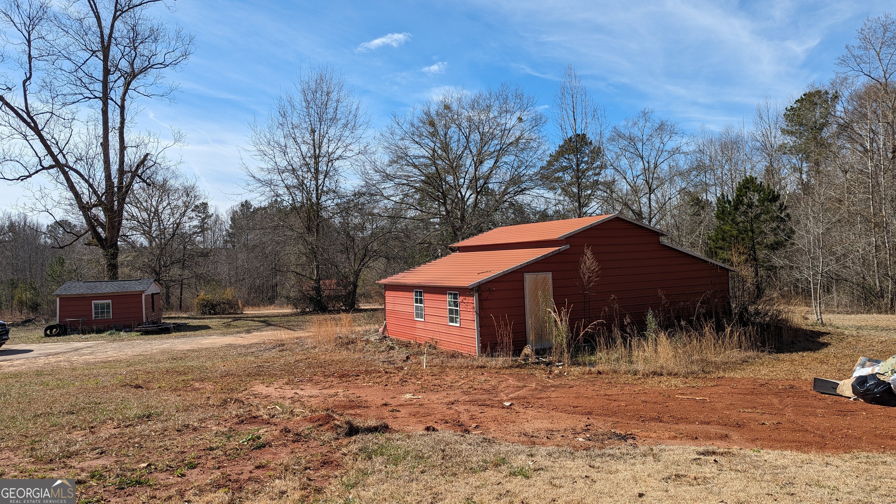 789 Hammett Road LaGrange, GA 30241 - Photo 19 of 26 a view of a house with a yard covered in snow