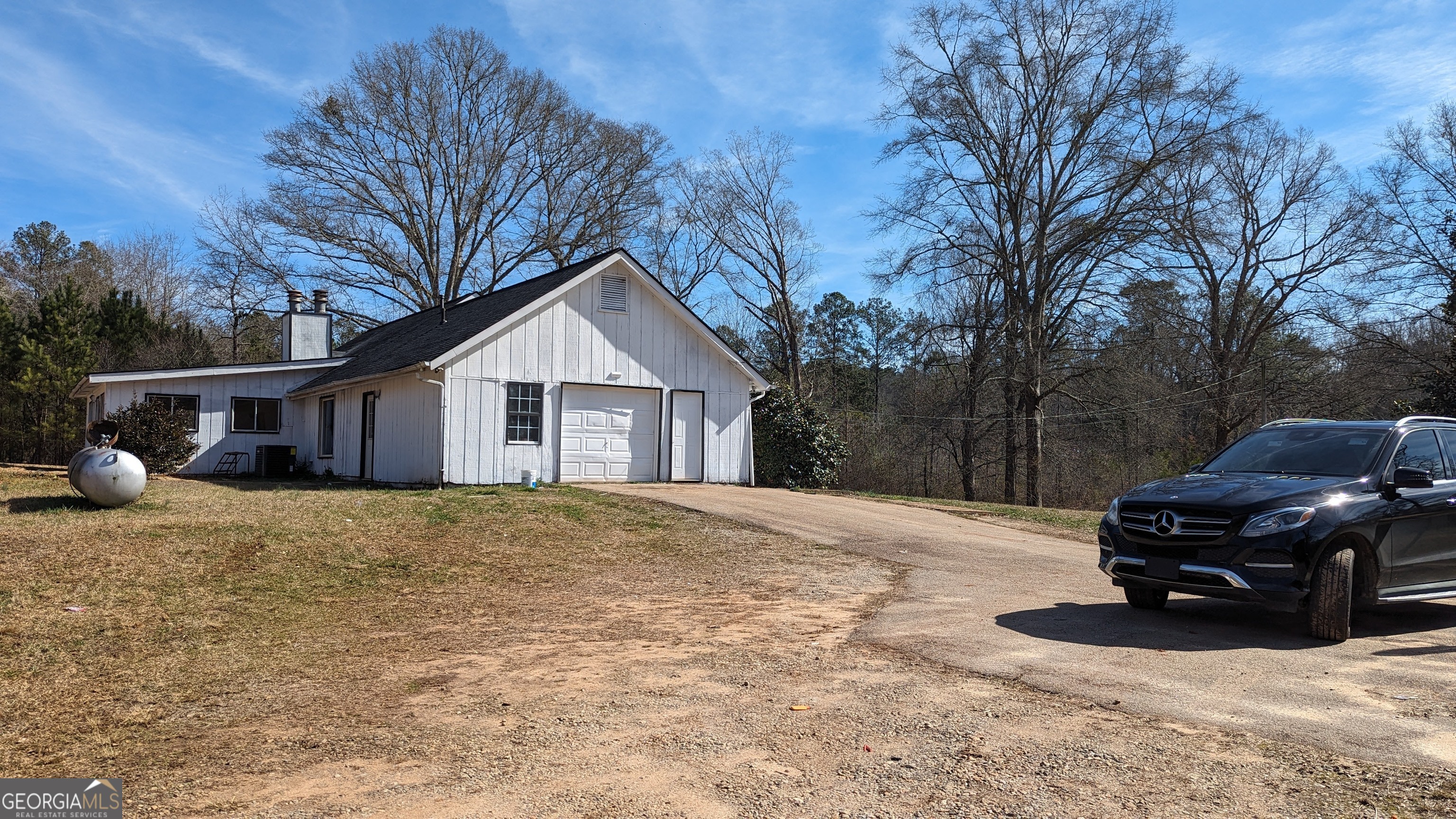 789 Hammett Road LaGrange, GA 30241 - Photo 23 of 26 a house view with a car parked in front of house
