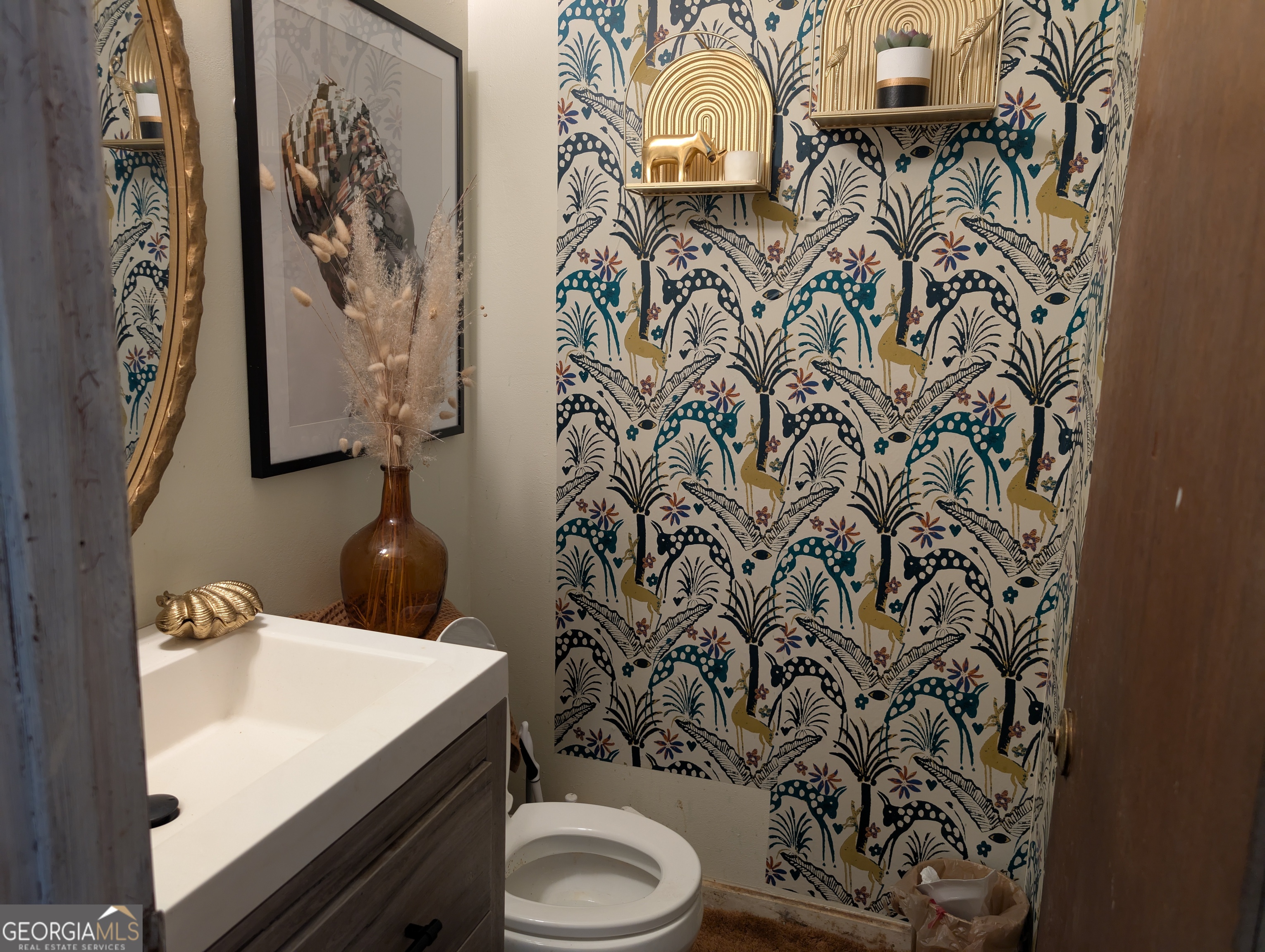 789 Hammett Road LaGrange, GA 30241 - Photo 4 of 26 a bathroom with a sink toilet and shower