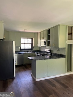 789 Hammett Road LaGrange, GA 30241 - Photo 5 of 26 a kitchen with a refrigerator and a sink