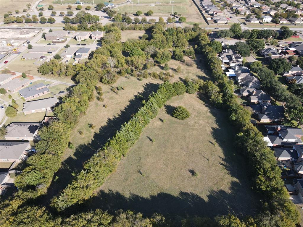 1407 South Uhl Road DeSoto, TX 75115 - Photo 2 of 2 an aerial view of a house with a yard