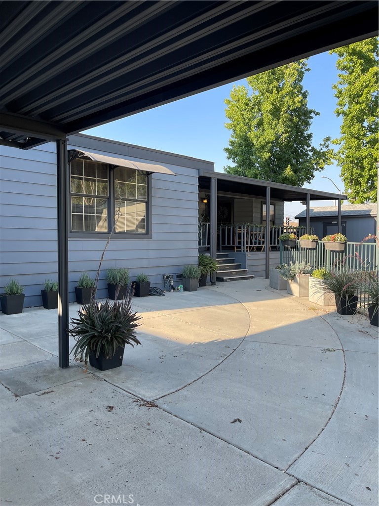 31348 North Lakehills Road, Unit 2 Castaic, CA 91384 - Photo 1 of 42 a view of a house with porch and furniture