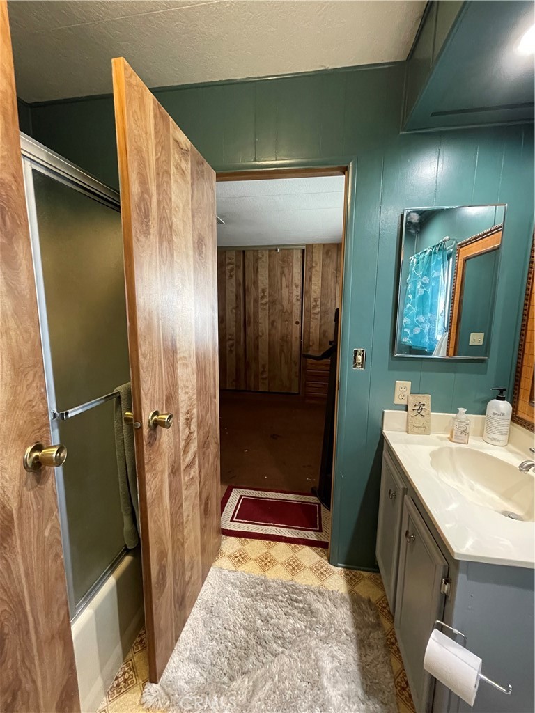 31348 North Lakehills Road, Unit 2 Castaic, CA 91384 - Photo 13 of 42 a bathroom with a sink a toilet and shower