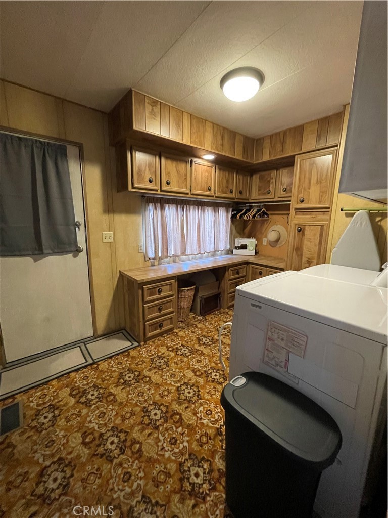 31348 North Lakehills Road, Unit 2 Castaic, CA 91384 - Photo 15 of 42 a bedroom with a bed and a window in it