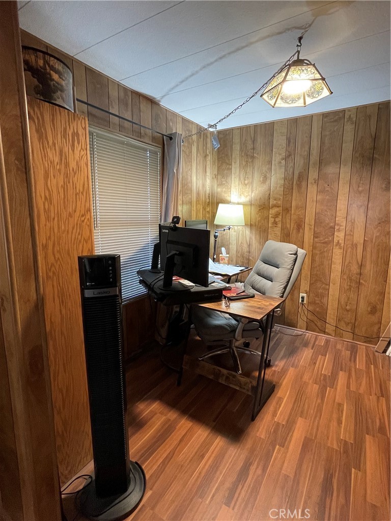 31348 North Lakehills Road, Unit 2 Castaic, CA 91384 - Photo 27 of 42 a workspace with furniture and wooden floor