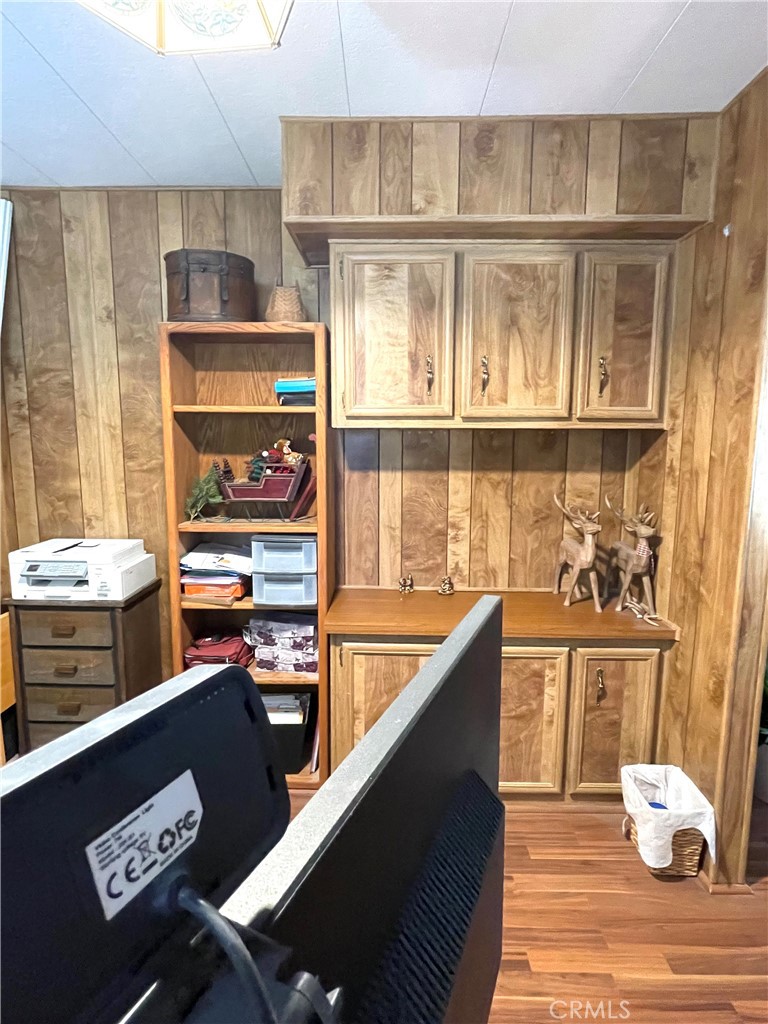 31348 North Lakehills Road, Unit 2 Castaic, CA 91384 - Photo 28 of 42 a kitchen with stainless steel appliances cabinets and a table