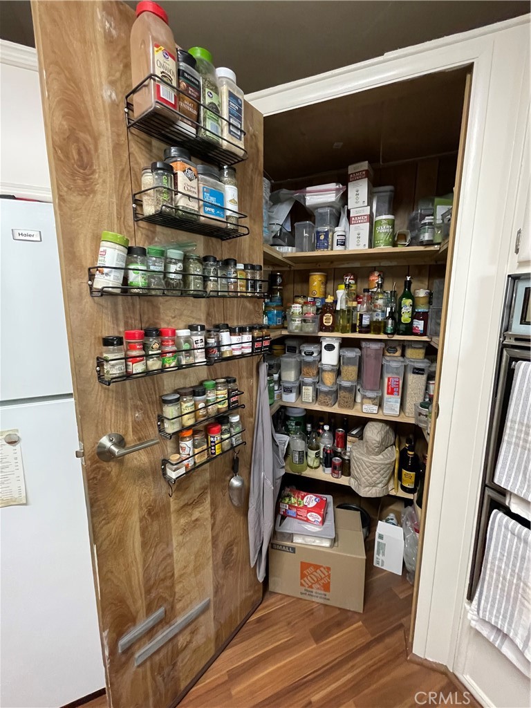 31348 North Lakehills Road, Unit 2 Castaic, CA 91384 - Photo 39 of 42 a shelf of wine sitting on a shelf