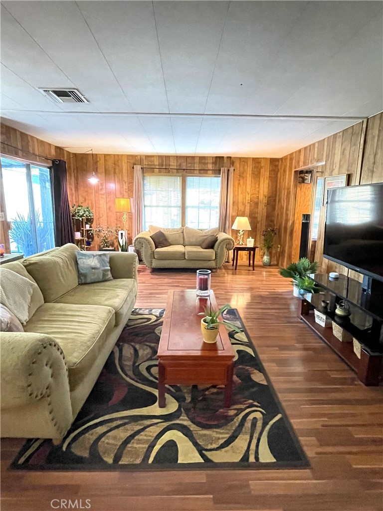 31348 North Lakehills Road, Unit 2 Castaic, CA 91384 - Photo 4 of 42 a living room with furniture and a flat screen tv