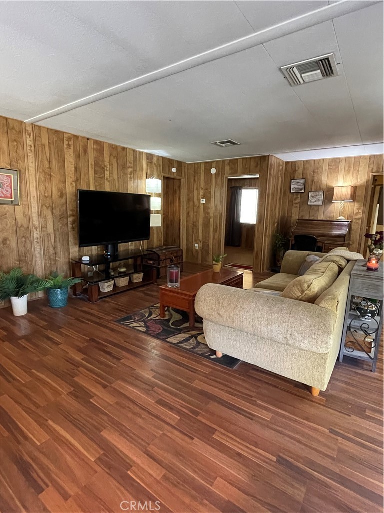 31348 North Lakehills Road, Unit 2 Castaic, CA 91384 - Photo 41 of 42 a living room with furniture and a flat screen tv