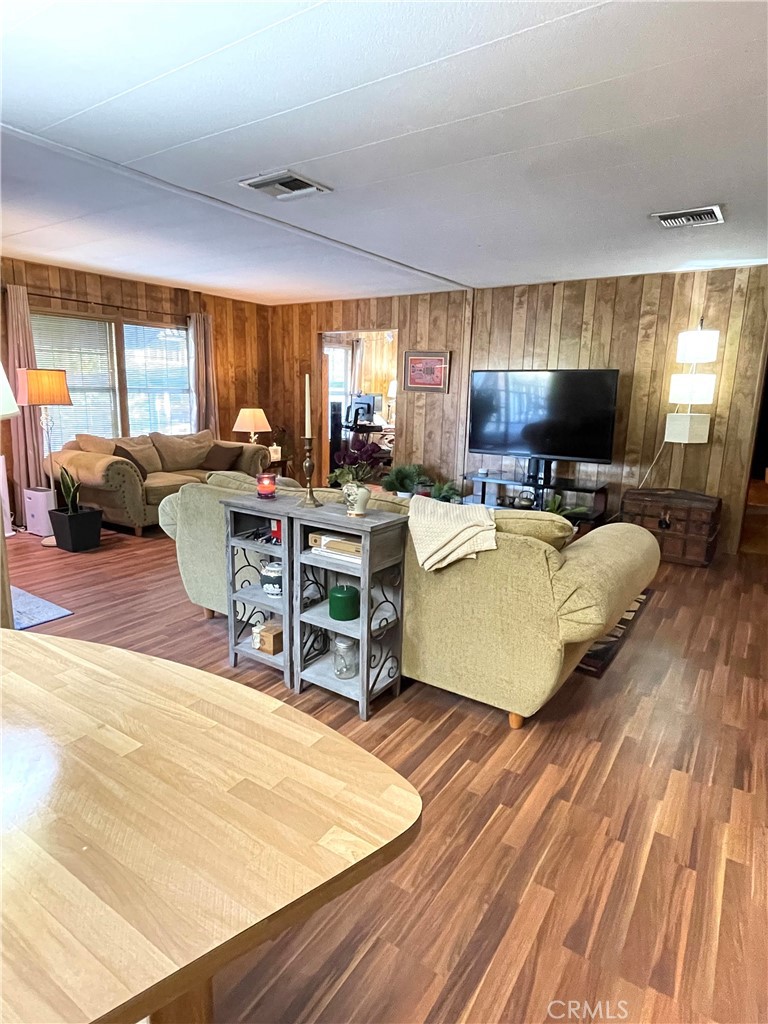 31348 North Lakehills Road, Unit 2 Castaic, CA 91384 - Photo 5 of 42 a living room with furniture flat screen tv and a large window
