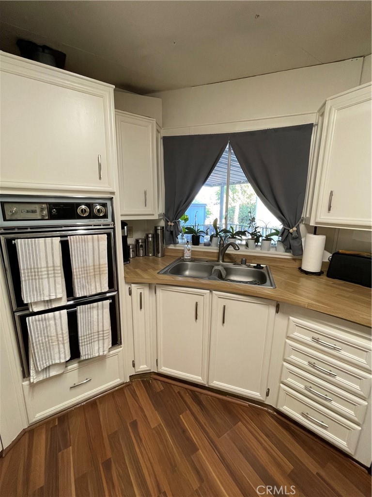 31348 North Lakehills Road, Unit 2 Castaic, CA 91384 - Photo 6 of 42 a kitchen with a sink and a window