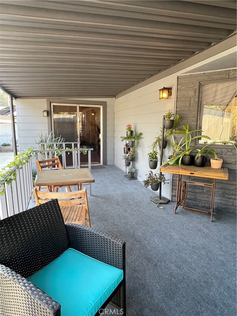 31348 North Lakehills Road, Unit 2 Castaic, CA 91384 - Photo 8 of 42 a view of a porch with furniture