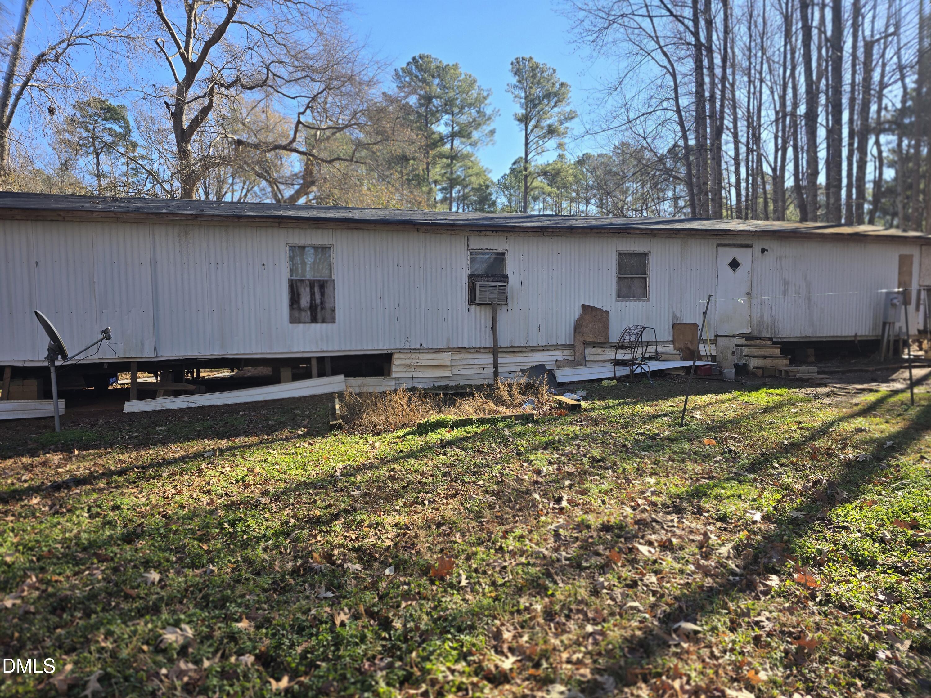 6782 Pinecrest Road Zebulon, NC 27597 - Photo 3 of 13 a view of swimming pool with a yard