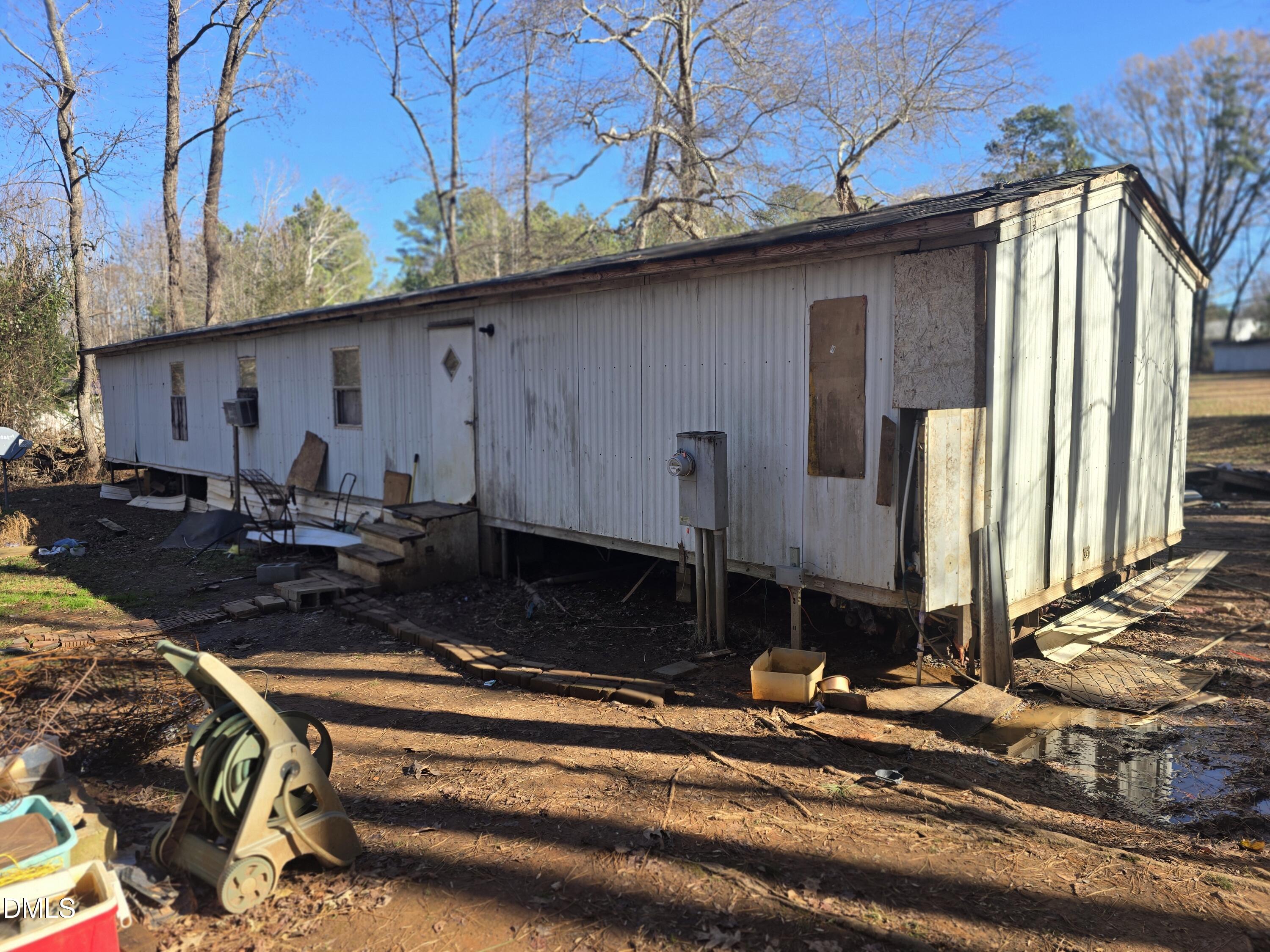 6782 Pinecrest Road Zebulon, NC 27597 - Photo 4 of 13 a backyard of a house