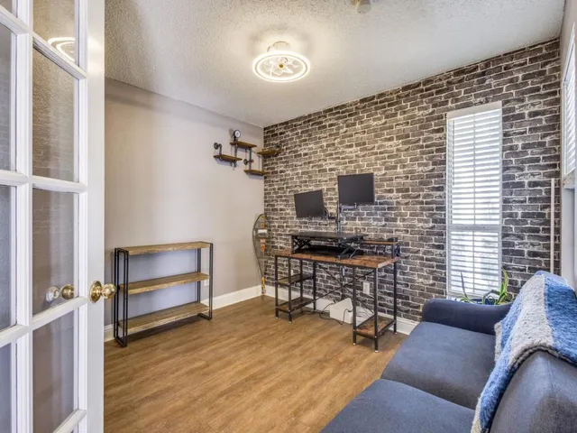 a view of kitchen with cabinets and wooden floor