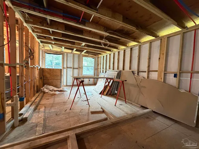 a view of a living room with furniture