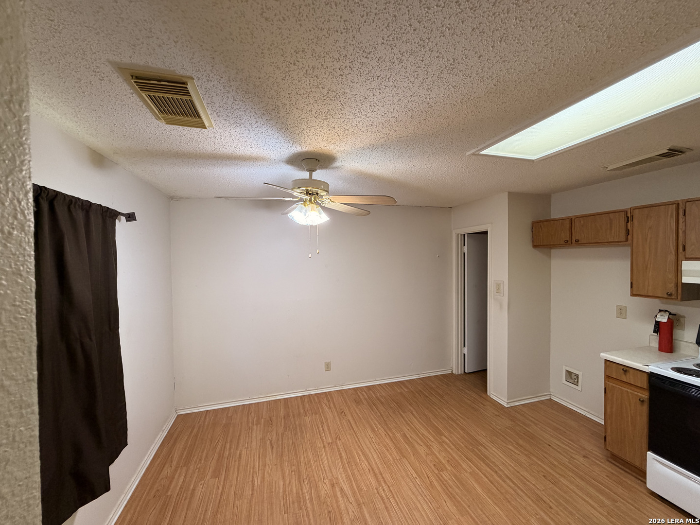 8349 Morning Grove Converse, TX 78109 - Photo 5 of 27 a view of empty room with wooden floor
