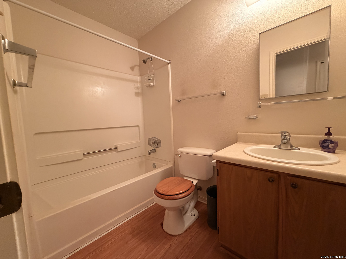 8349 Morning Grove Converse, TX 78109 - Photo 9 of 27 a bathroom with a sink a toilet and shower