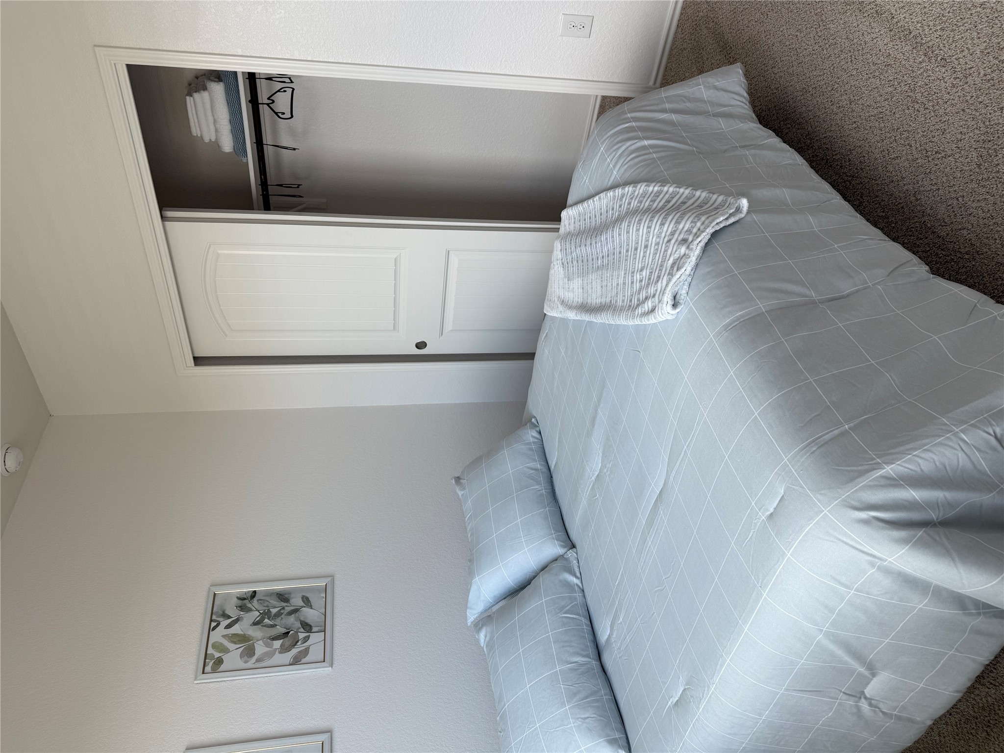 14907 Retha Pass Austin, TX 78725 - Photo 8 of 22 A well-lit bedroom provides comfortable living space with a closet.