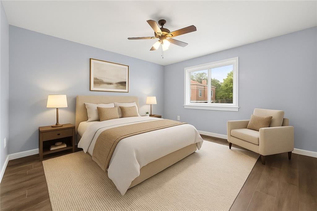 519 Center Street Carnegie, PA 15106 - Photo 16 of 44 a bedroom with furniture and a window