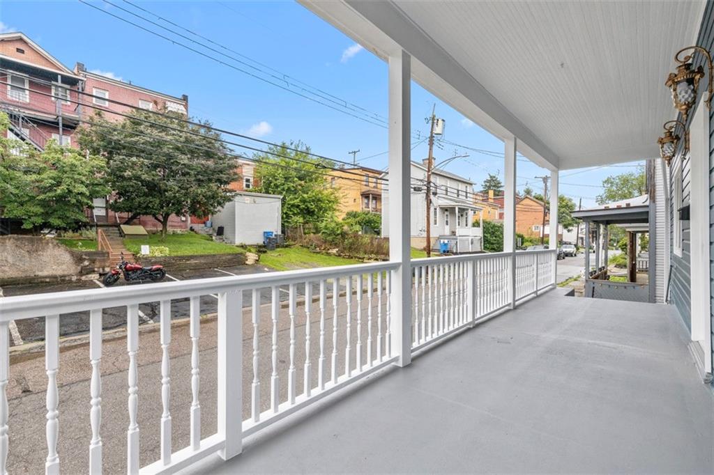 519 Center Street Carnegie, PA 15106 - Photo 2 of 44 a view of a building from a porch
