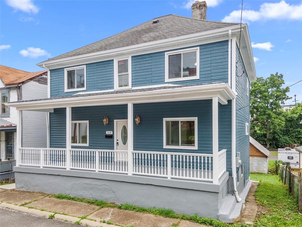 519 Center Street Carnegie, PA 15106 - Photo 43 of 44 a front view of a house with a garden