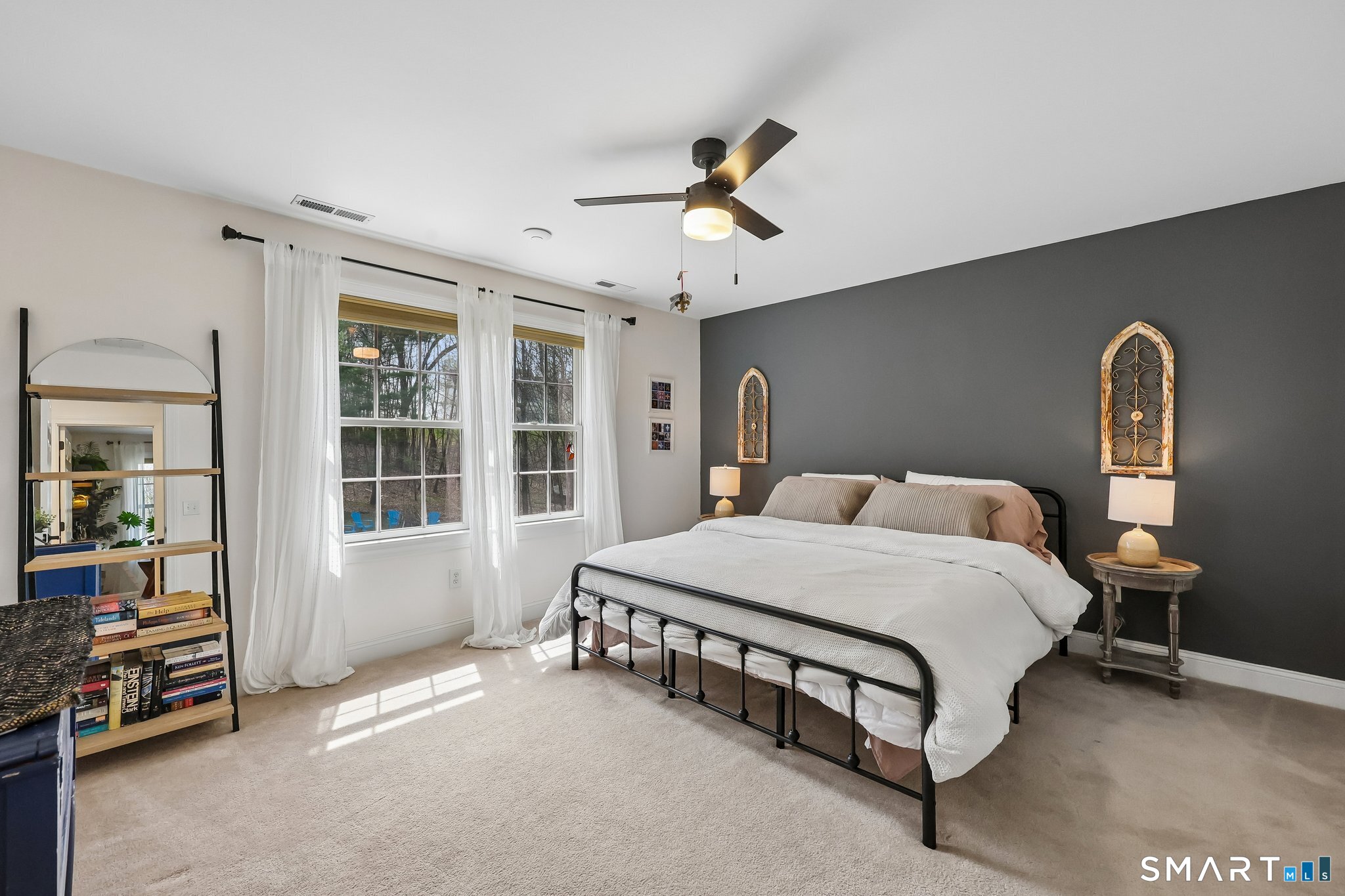 3 East Lake Road Danbury, CT 06811 - Photo 26 of 37 Bedroom 3 is generously sized and easily accommodates a king-sized bed, with soft wall-to-wall carpeting adding warmth and comfort to the space.