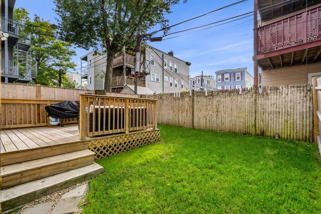 7 O Street, Unit 1 Boston, MA 02127 - Photo 12 of 15 a view of a house with a yard