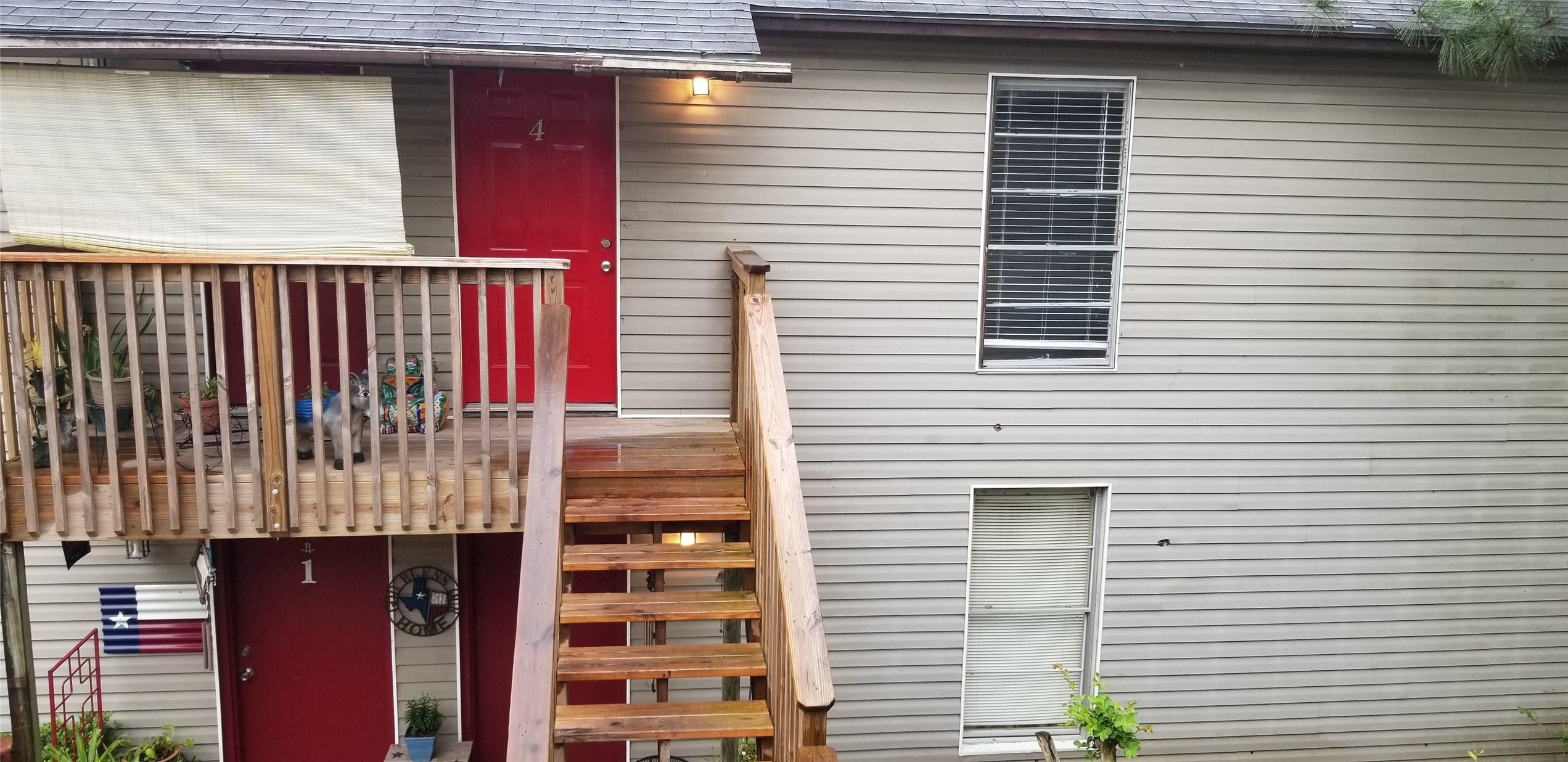 2017 West Sidnor Street, Unit 6 Alvin, TX 77511 - Photo 11 of 13 a view of a house with a balcony