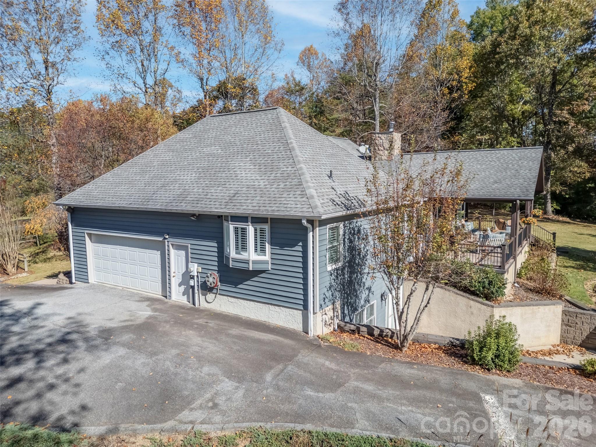 1340 Macedonia Road Saluda, NC 28773 - Photo 9 of 45 a view of a house with a outdoor space