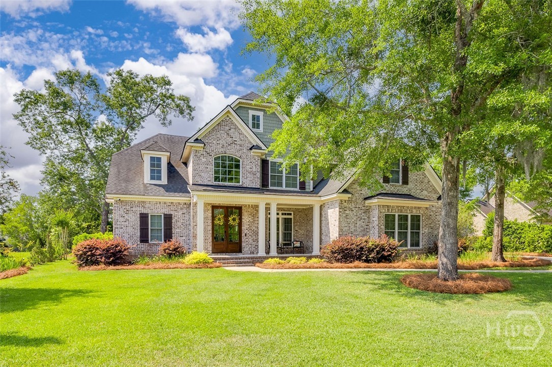 7 Reed Grass Lane Savannah, GA 31405 - Photo 1 of 70 Stunning all brick home on a quiet cul-de-sac and lagoon view out back