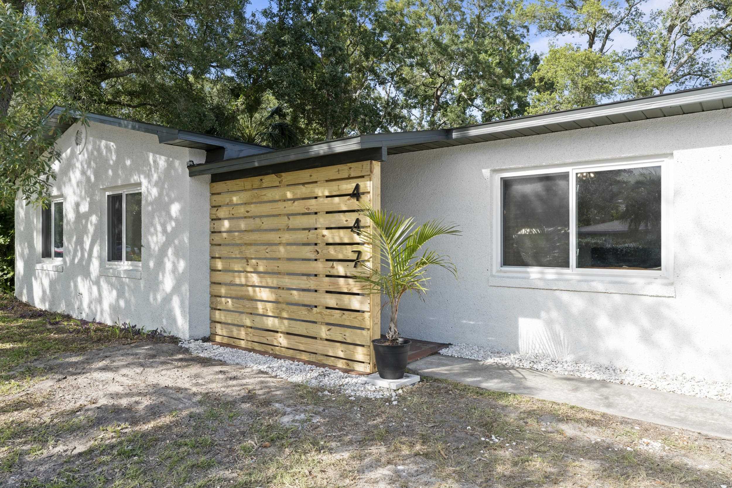 447 Segovia Road St. Augustine, FL 32086 - Photo 6 of 47 a view of a house with a tree