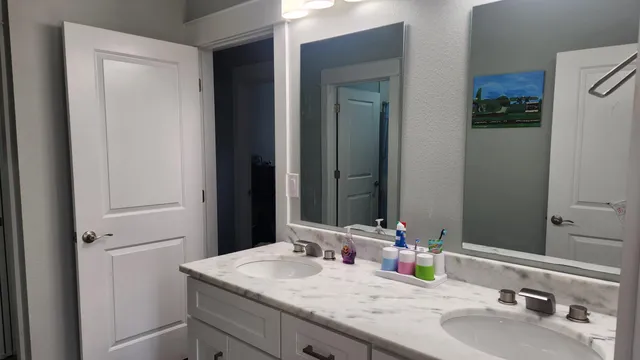 a bathroom with a toilet and a sink