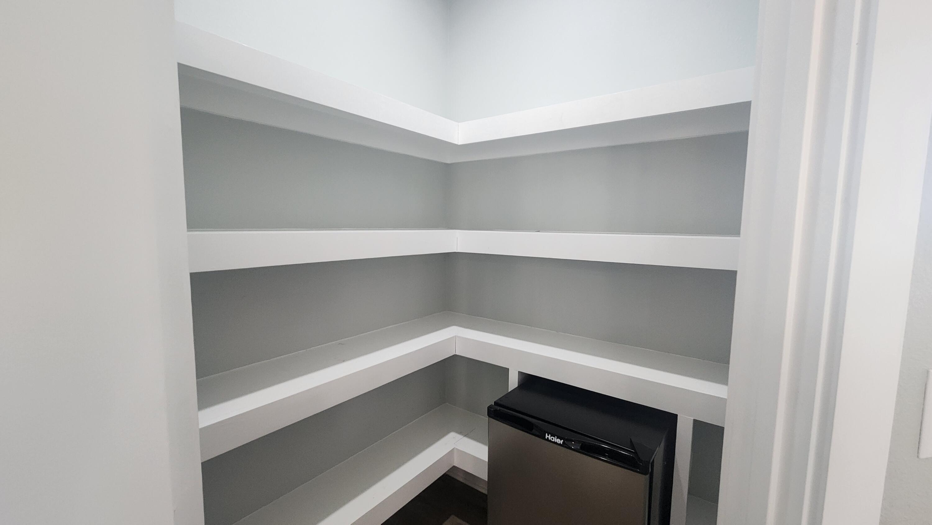 9149 Timber Lane Navarre, FL 32566 - Photo 5 of 44 a storage room with a cabinets