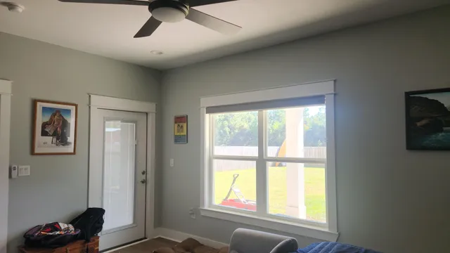 a bathroom with a shower sink and mirror