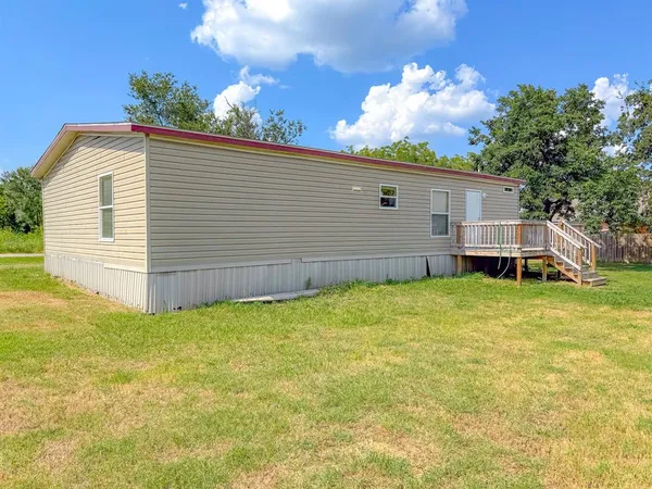 a view of a backyard with a garden