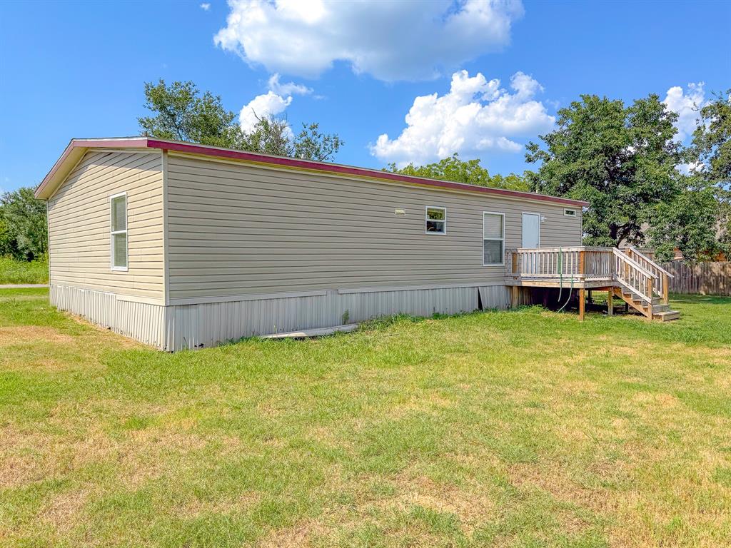 103 North 7th Street Dawson, TX 76639 - Photo 19 of 19 a view of a backyard with a garden