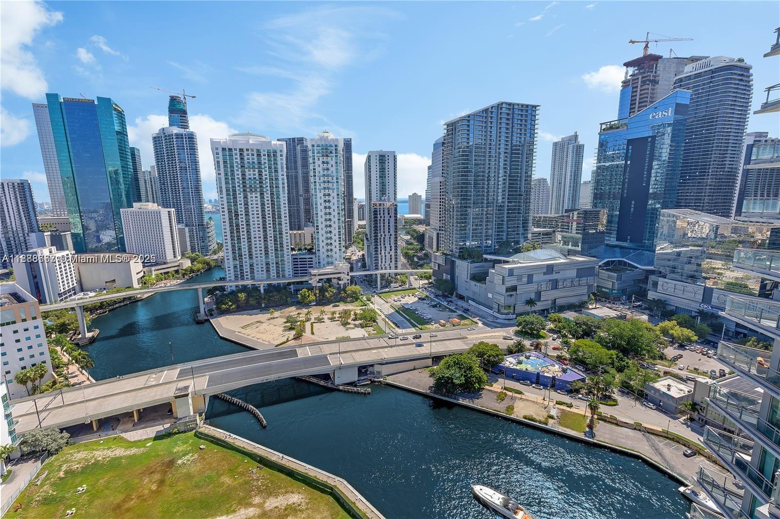 92 Southwest 3rd Street, Unit 3012 Miami, FL 33130 - Photo 17 of 18 a view of a swimming pool with outdoor seating