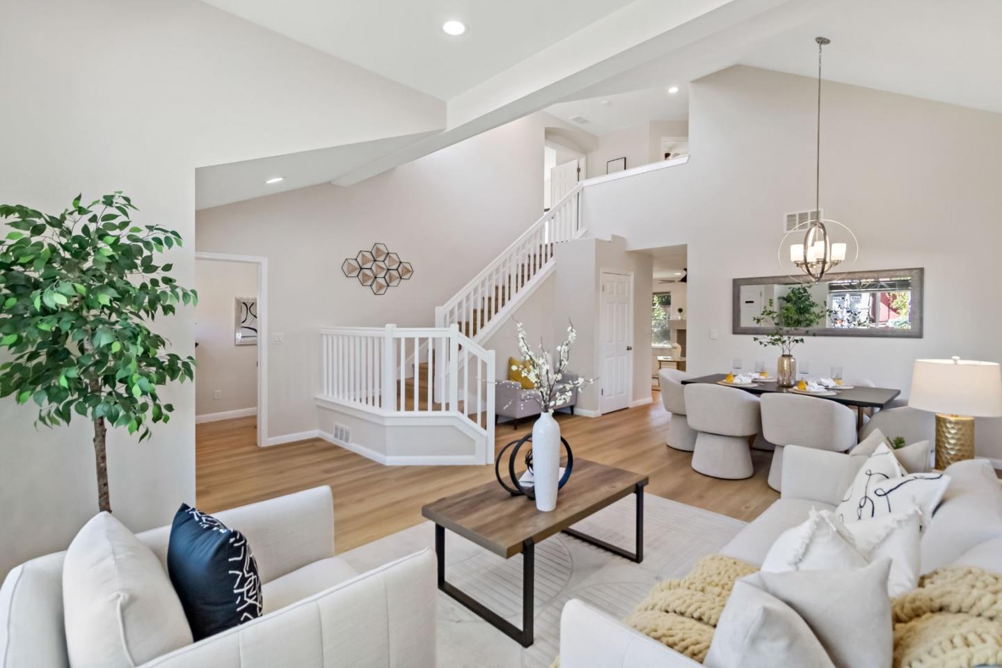 4593 Fallstone Court San Jose, CA 95124 - Photo 12 of 59 a living room with furniture and a wooden floor