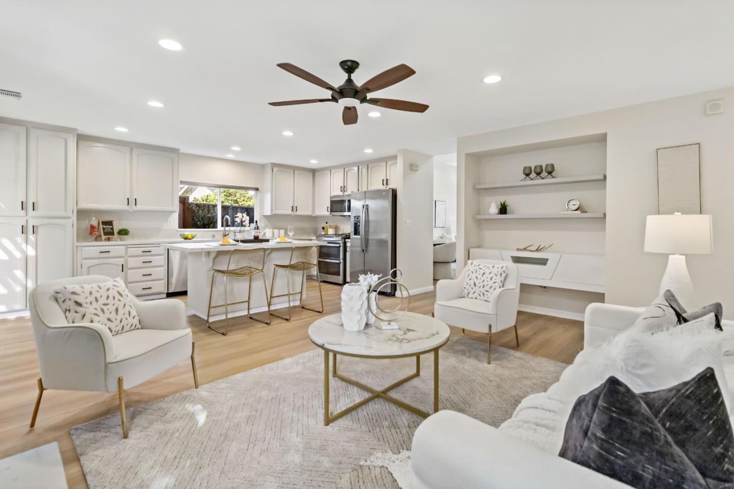 4593 Fallstone Court San Jose, CA 95124 - Photo 19 of 59 a living room with furniture kitchen view and a chandelier