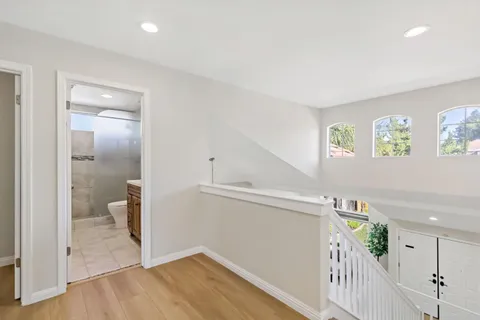 a view of entryway with wooden floor