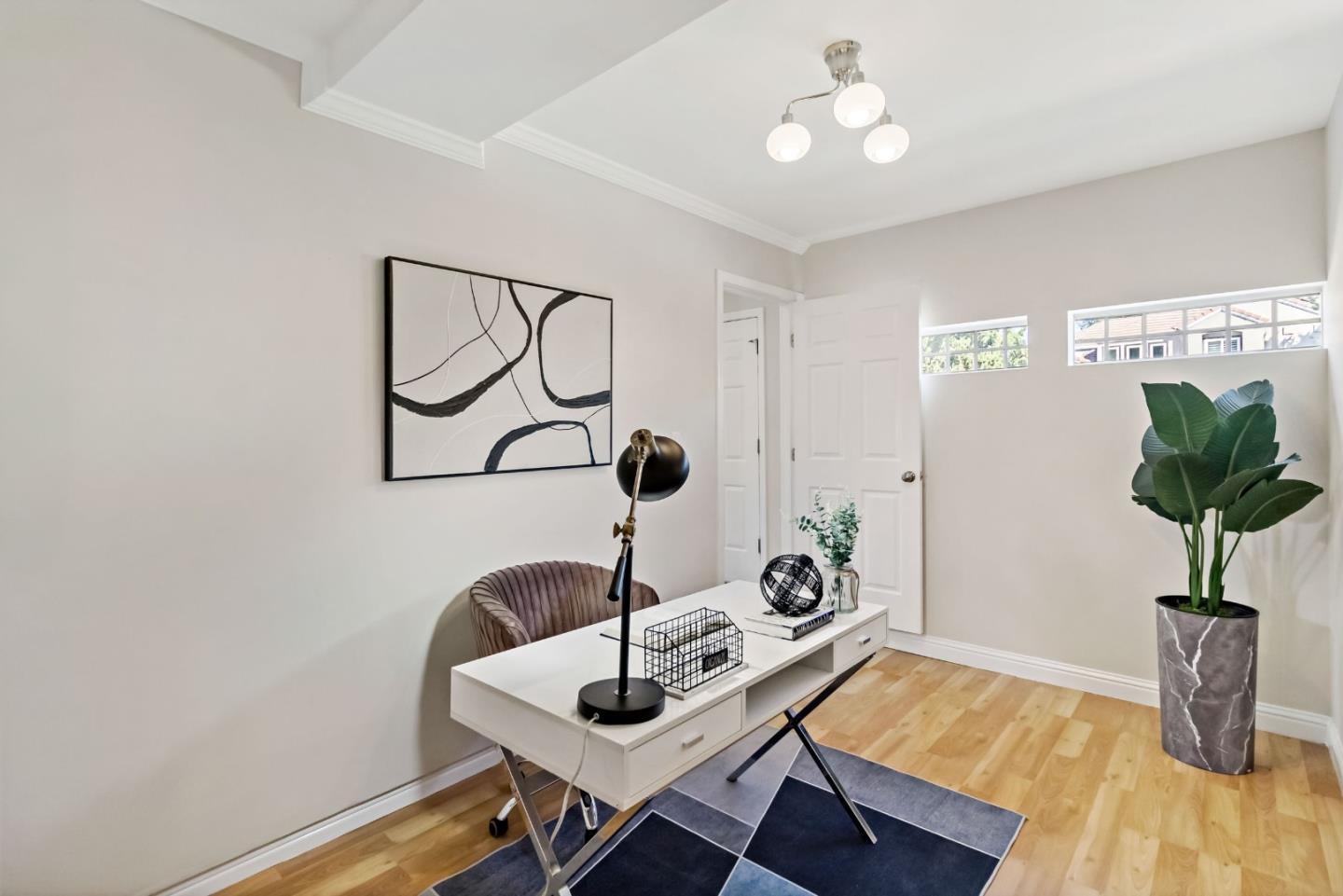 4593 Fallstone Court San Jose, CA 95124 - Photo 45 of 59 a view of a workspace with furniture and chandelier