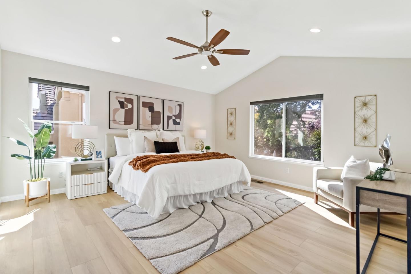 4593 Fallstone Court San Jose, CA 95124 - Photo 5 of 59 a bed sitting in a bedroom and window