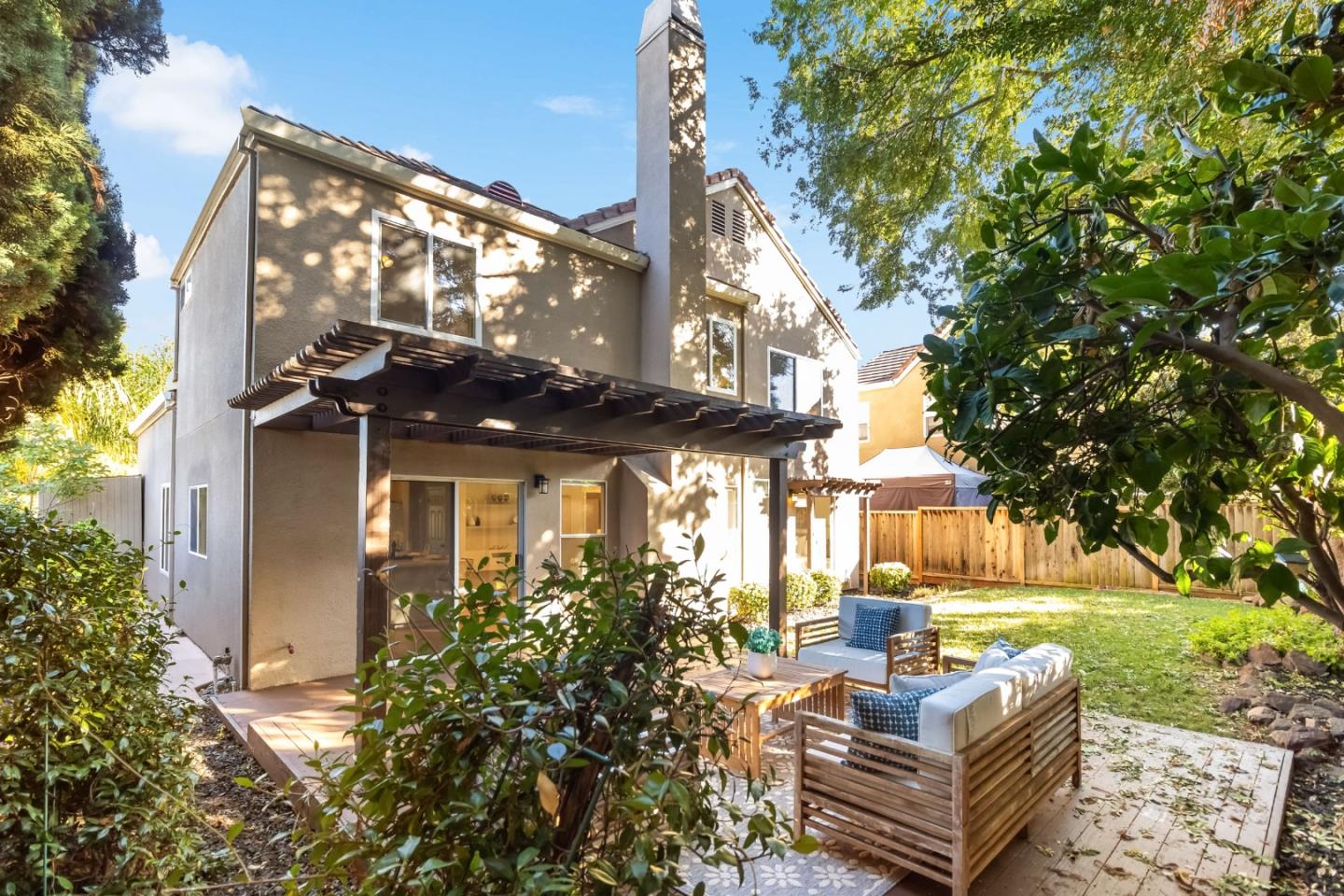 4593 Fallstone Court San Jose, CA 95124 - Photo 52 of 59 a front view of a house with garden and patio